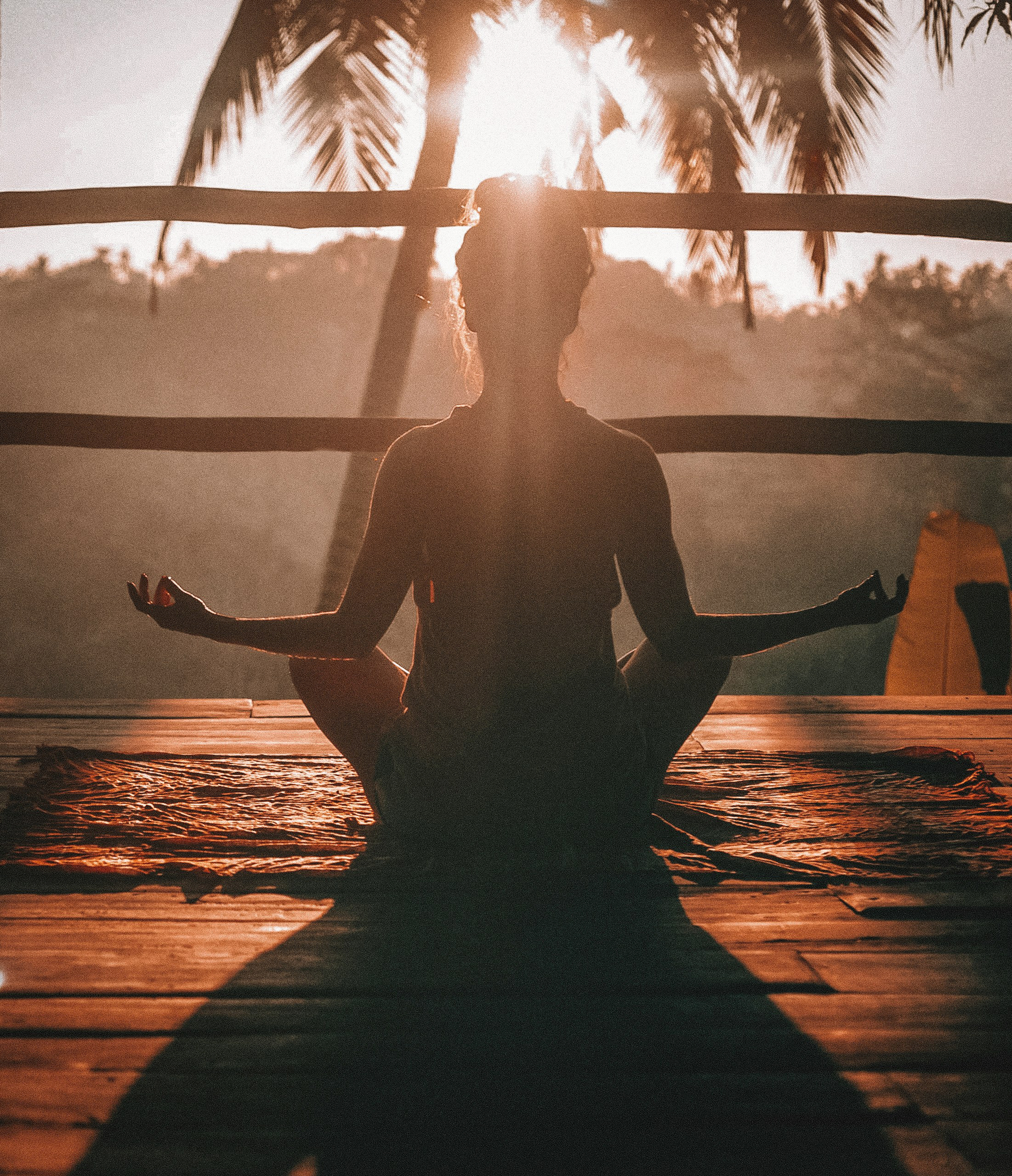 A morning yoga session peering into the jungle in Ubud, Bali - Photo by Jared Rice on Unsplash