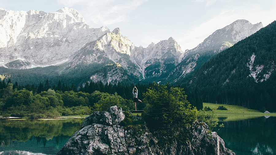 Yoga in the wild - Laghi di Fusine, Italy - Photo by Mikita Karasiou on Unsplash